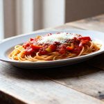 Stamppot rauwe andijvie met spek en salami