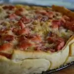 Yoghurt met perzik en pranaatappelpitjes