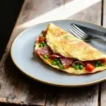 Yoghurt met perzik en pranaatappelpitjes