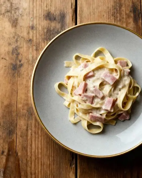 Tagliatelle met ham-roomsaus