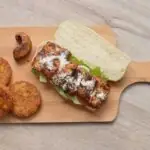 Pommes duchesse met linzensalade en witvis